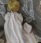 porcelain baby doll white gown back